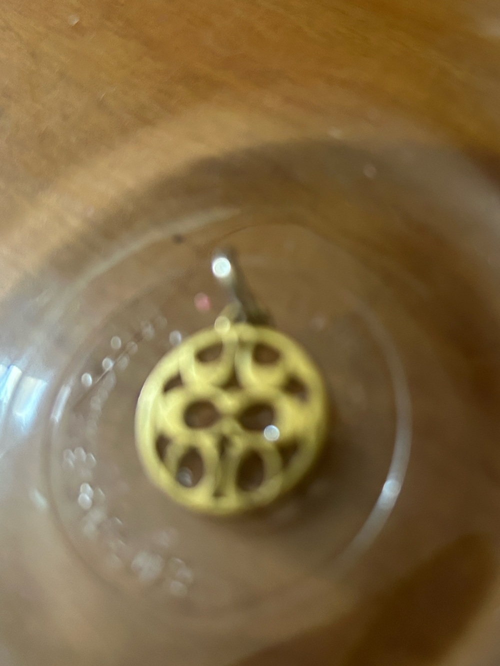 Coach Gold-tone Round Cutout Charm Pendant